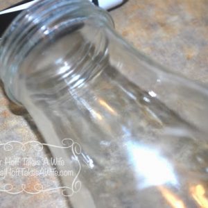 Easiest way to remove an ink label printed on a glass jar!