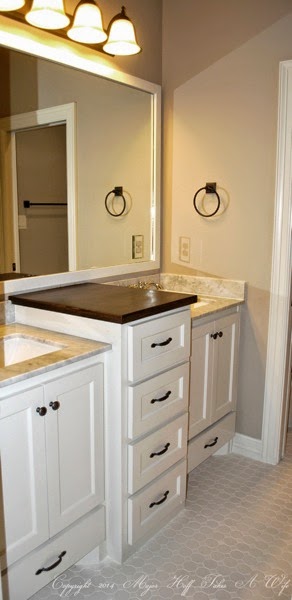 Secondary bath with hexagon tile and double vanity