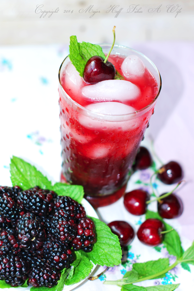Mint and Cherry Garnish on iced drink
