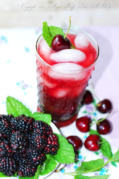 Mint and Cherry Garnish on iced drink.png Mint and Cherry Garnish on iced drink
