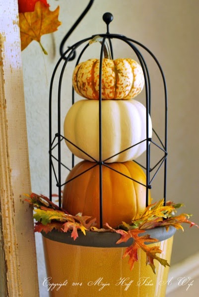 Pumpkin topiary with dollar store pumpkins