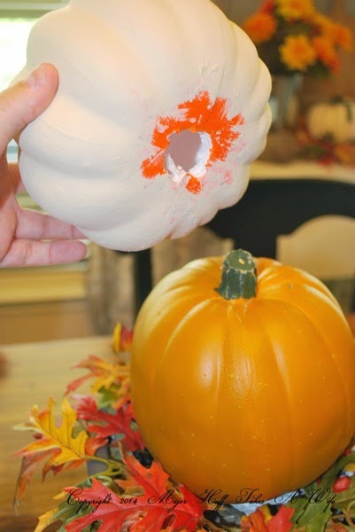 Stacking pumpkins for topiary
