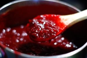 cooking homemade cranberry sauce on the stovetop