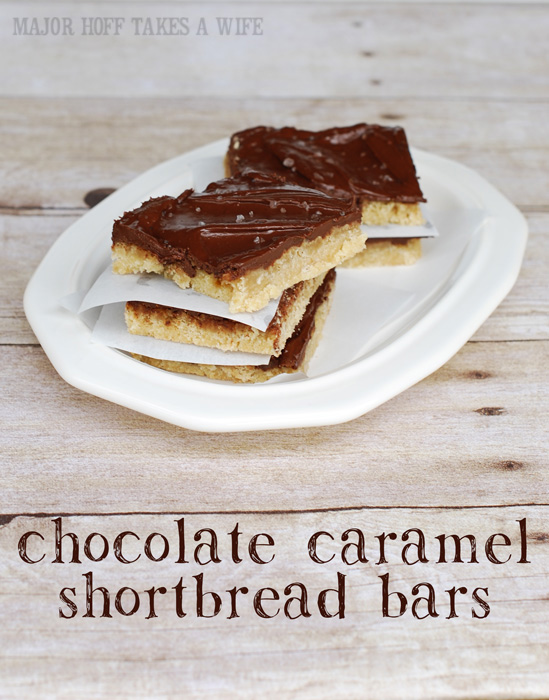 Salted caramel chocolate shortbread bars are a great twist on the traditional millionaire shortbread. These decadent cookies feature dark or milk chocolate, homemade caramel sauce and an easy one pan shortbread cookie base all topped with a dusting of salt to level out that sweetness . Each square slice is dessert heaven!  via @mrsmajorhoff