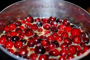 Cranberries boiling on stovetop