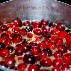 Cranberries boiling on stovetop
