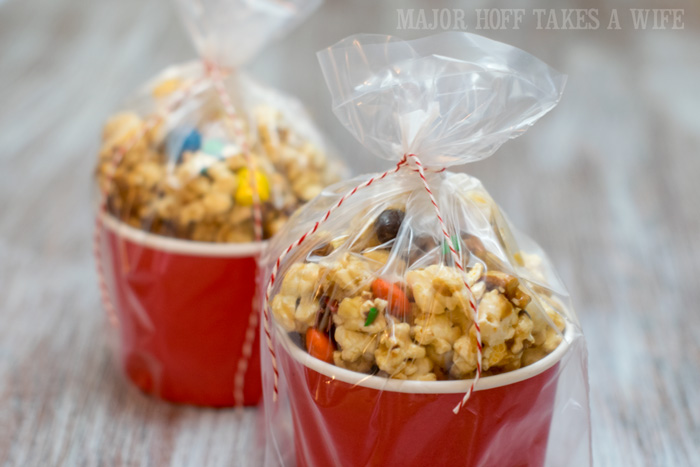 Movie Munch Snack Mix wrapped for gifting. It's time for a Family Movie Night! You won't want to miss this recipe for the fabulous Movie Munch! Can you guess what the secret ingredient is? Post also shows how to create your own Guardians of the Galaxy Gift Basket, perfect for your favorite super hero fans, or for a Finals Survival kit. #OwnTheGalaxy #CBias #sp #ad