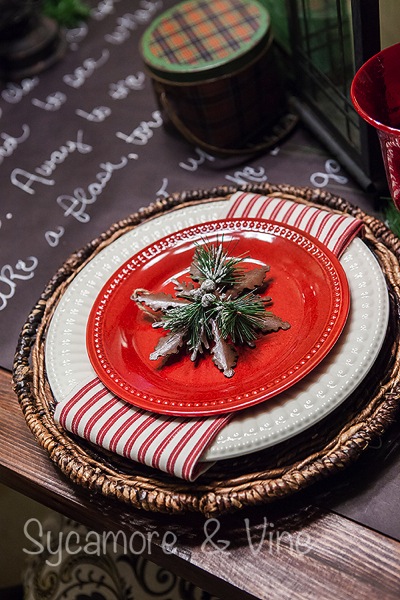 Plaid Country Christmas Table setting with greenery