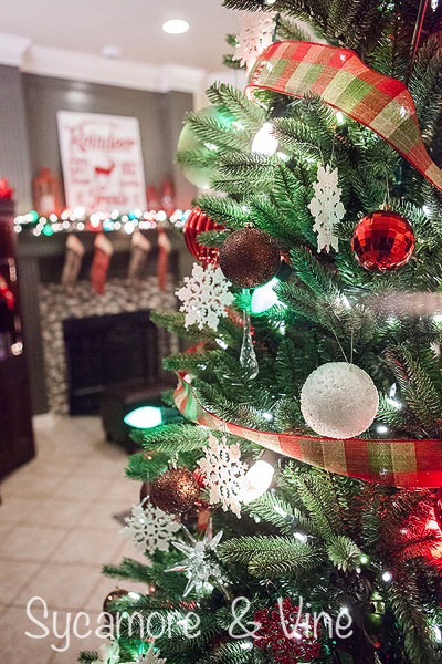 Use plaid ribbon on a plaid country Christmas inspired tree.
