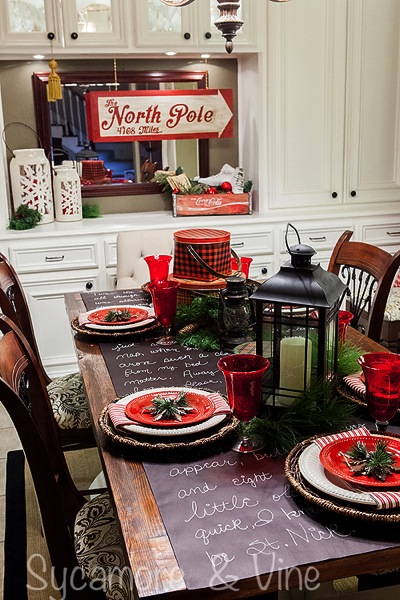 Vintage plaid tinware and North Pole inspired accents in the dining room.