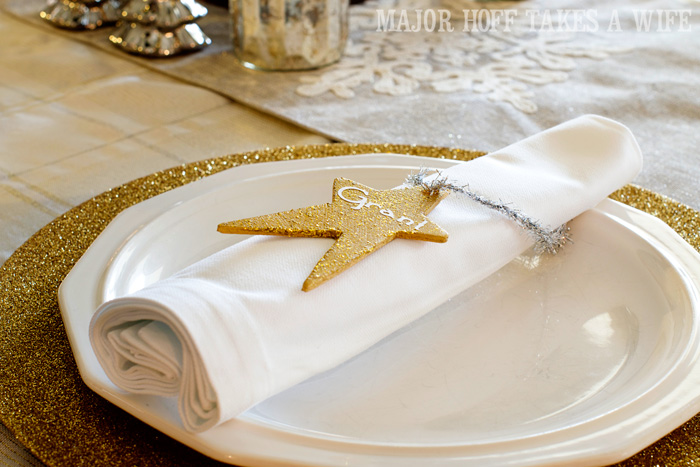 Place settings. A delightful Dining Room Holiday Tour. See how Mrs Major Hoff decorates for Christmas. The tour features table decorations, dining room decorating ideas, place settings and an idea for  homemade Christmas gift that can be personalized for your holiday guests. This post is part of the Home For The Holidays Blog Tour.