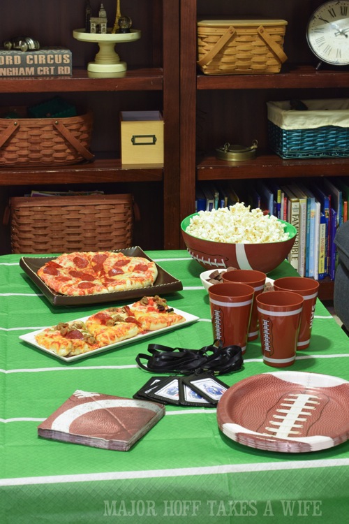 Football video game party. Looking for a fun party for your teenage boy? Why not throw a Football video game party? Easy ideas for how to entertain kiddos during the Big Game. Features DiGiorno pizza, personalized football cups, free printable lanyards, and an incredible recipe for football shaped ice cream sandwiches! #GameTimeMVP #CollectiveBias #ad