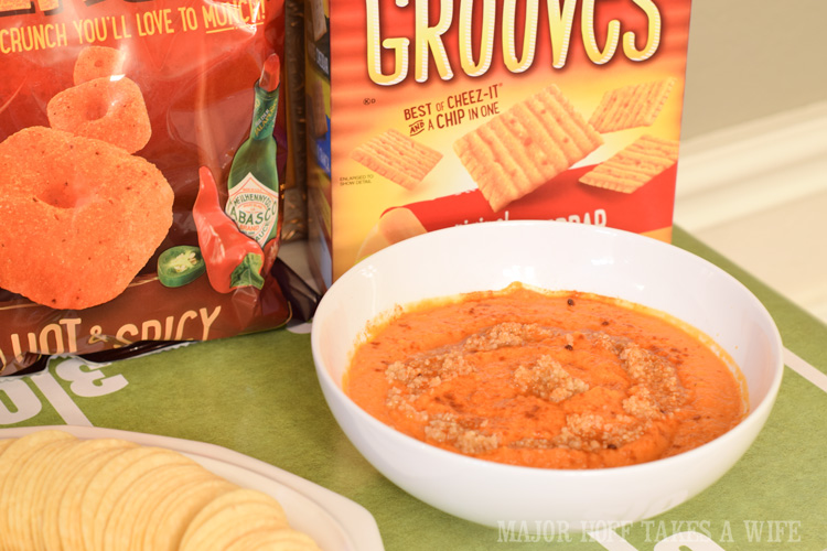 Homemade hummus made without tahini makes for a great dip for your friends with nut and seed allergies. An easy to throw party for the Big Game. Features easy party ideas for snacks, dips and decor. Includes a recipe for Roasted Red Pepper Hummus without seeds! #BigGameSnacks #collectiveBias #ad 