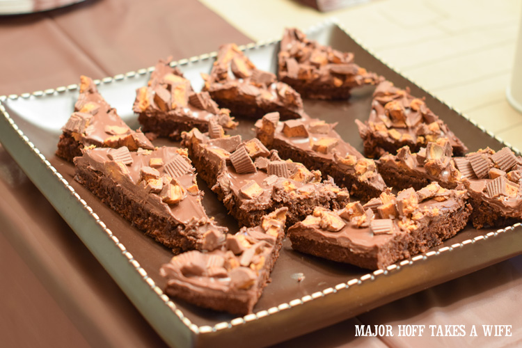 Peanut butter cup brownies satisfy the sweet tooth. An easy to throw party for the Big Game. Features easy party ideas for snacks, dips and decor. Includes a recipe for Roasted Red Pepper Hummus without seeds! #BigGameSnacks #collectiveBias #ad 