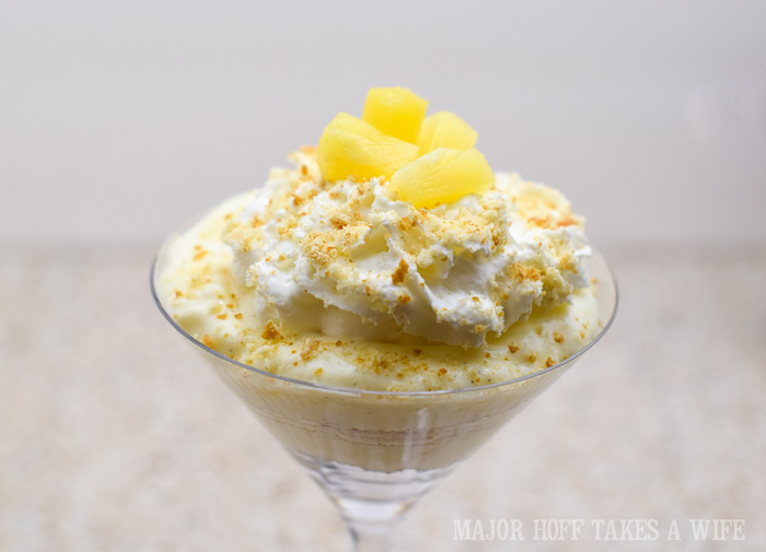 Pineapple Parfait with Vanilla cookie crumbs whip cream and pineapple on top