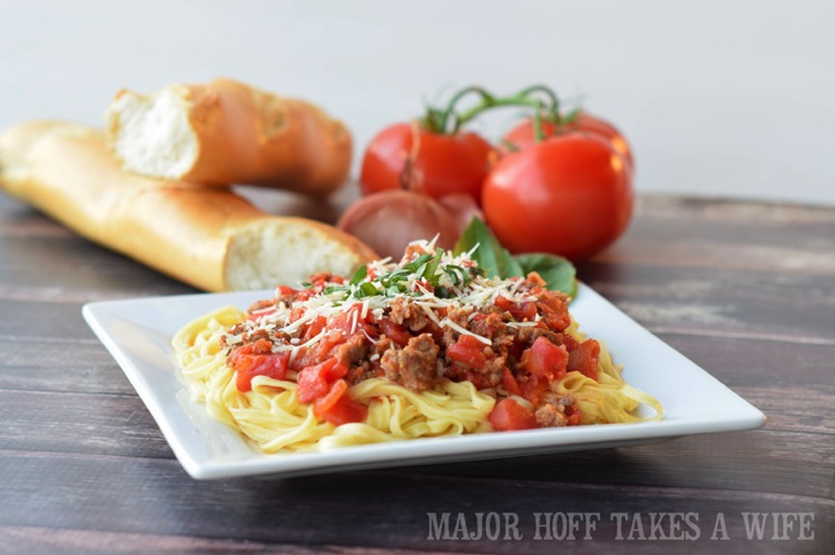 Sausage in marinara sauce. The perfect way to learn how to make homemade spaghetti sauce! In this learn to cook series, you will be taught everything you need to know to make the most scrumptious Italian Sausage Spaghetti Marinara Sauce. Part of the #TeachMeToCookSeries this meal is done and on the table in less than 30 minutes! WOW! #Pasta #spaghetti #homemade #Learntocook