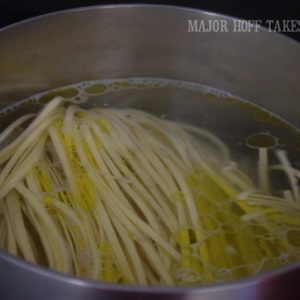 Boiling noodles for homemade spaghetti sauce
