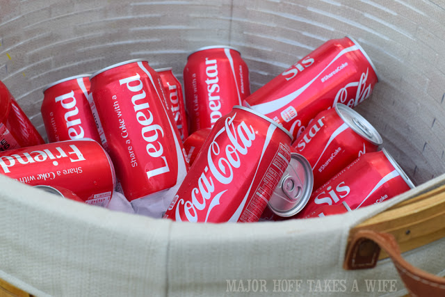 Share a Coke with a friend. Everyone loves a basket full of Coke!