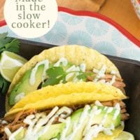 These easy pork tacos will knock your socks off! Make those hectic back to school dinners even easier by utilizing your slow cooker for this recipe. Features an additional recipe for Cilantro Aioli that makes the tacos taste like you just ordered them from a taco truck! So grab your crockpot and let's get Taco Tuesday going! #porkrecipe #crockpot #taco