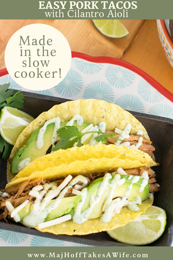 These easy pork tacos will knock your socks off! Make those hectic back to school dinners even easier by utilizing your slow cooker for this recipe. Features an additional recipe for Cilantro Aioli that makes the tacos taste like you just ordered them from a taco truck! So grab your crockpot and let's get Taco Tuesday going! #porkrecipe #crockpot #taco via @mrsmajorhoff