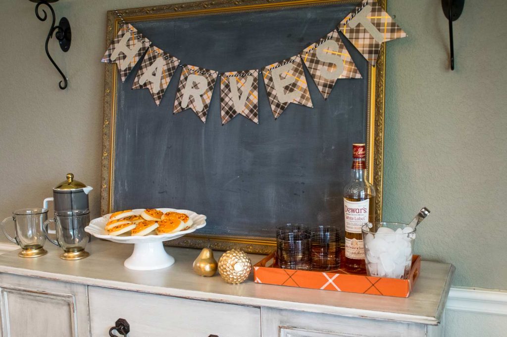 Place desserts and drinks on a buffet for fall guests