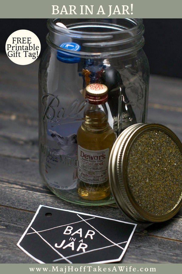 This bar in a jar is a perfect gift idea for men! Includes a free printable tag label. Easy to assemble with mini liquor bottles, some bar tools and more. The ideas are limitless! Great groomsman thank you gift or a gift for any man during the holidays! via @mrsmajorhoff