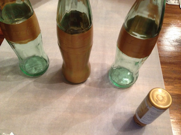 Gold paint coke bottles