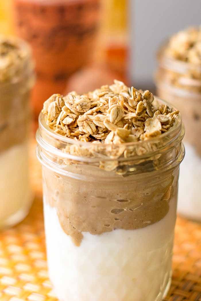 Pumpkin spice yogurt and granola parfaits will fill all your fall cravings! Simply layer Greek yogurt and granola with an easy to prepare pumpkin pudding. 