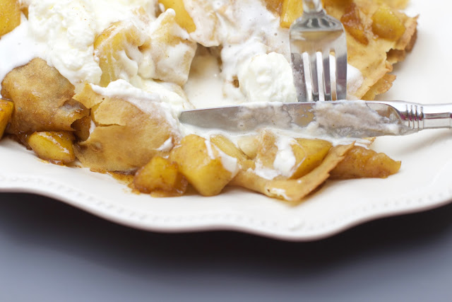 caramelized apple crepes loaded with whipped cream