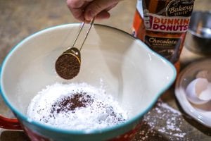 add coffee grounds to a flourless cookie to bring out the chocolate flavor.