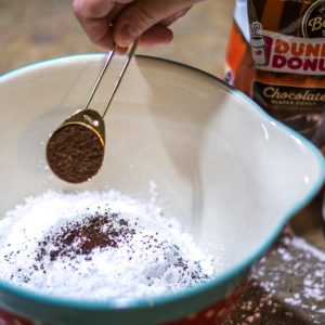 add coffee grounds to a flourless cookie to bring out the chocolate flavor.