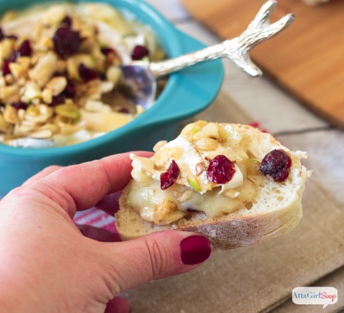 Baked brie with cranberries apples and walnuts