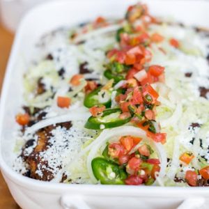 ancho beef and bean enchiladas