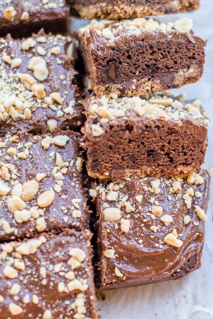 Peanut Butter Pretzel Brownies These brownies are always the hit of the party! Featuring a peanut pretzel chocolate chip crust, and an amazing peanut butter chocolate frosting - you'll be in heaven! #ad