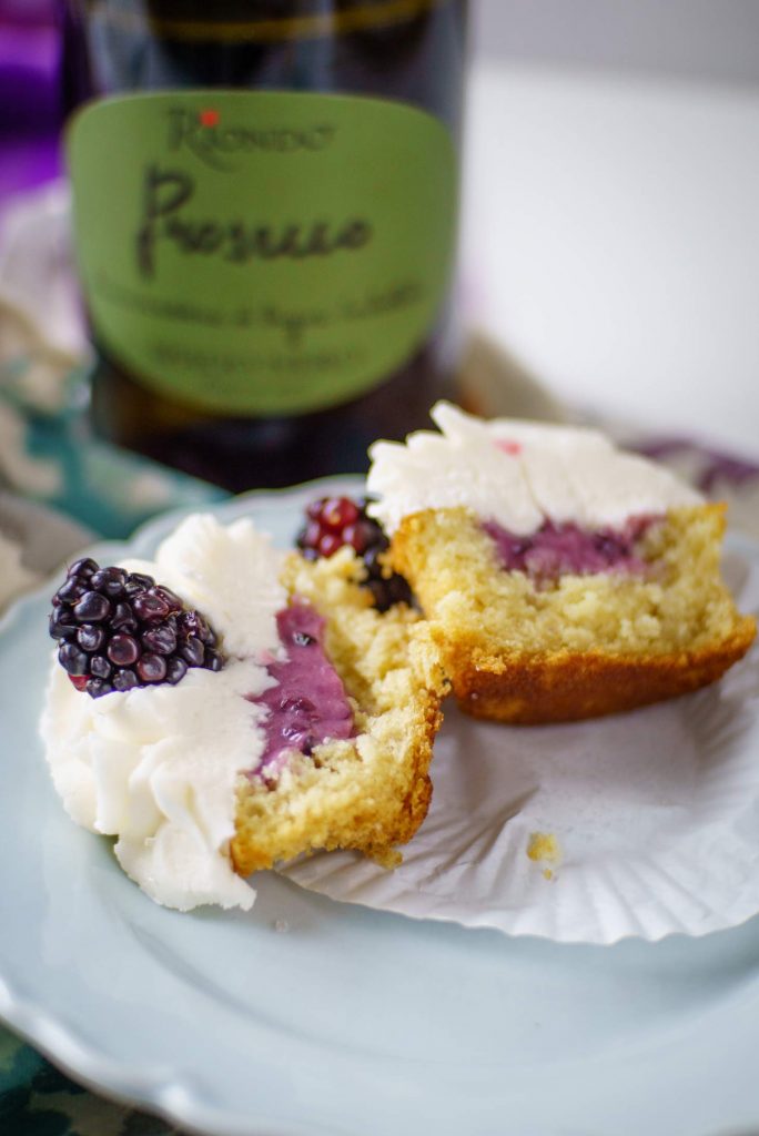 Blackberry compote stuffs cupcakes made with Prosecco sparkling wine