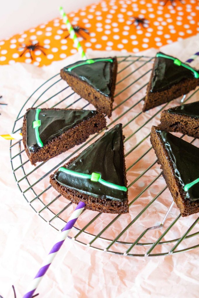 Witch hat cake pops use a box brownie mix, fast frosting, and an easy piping method!
