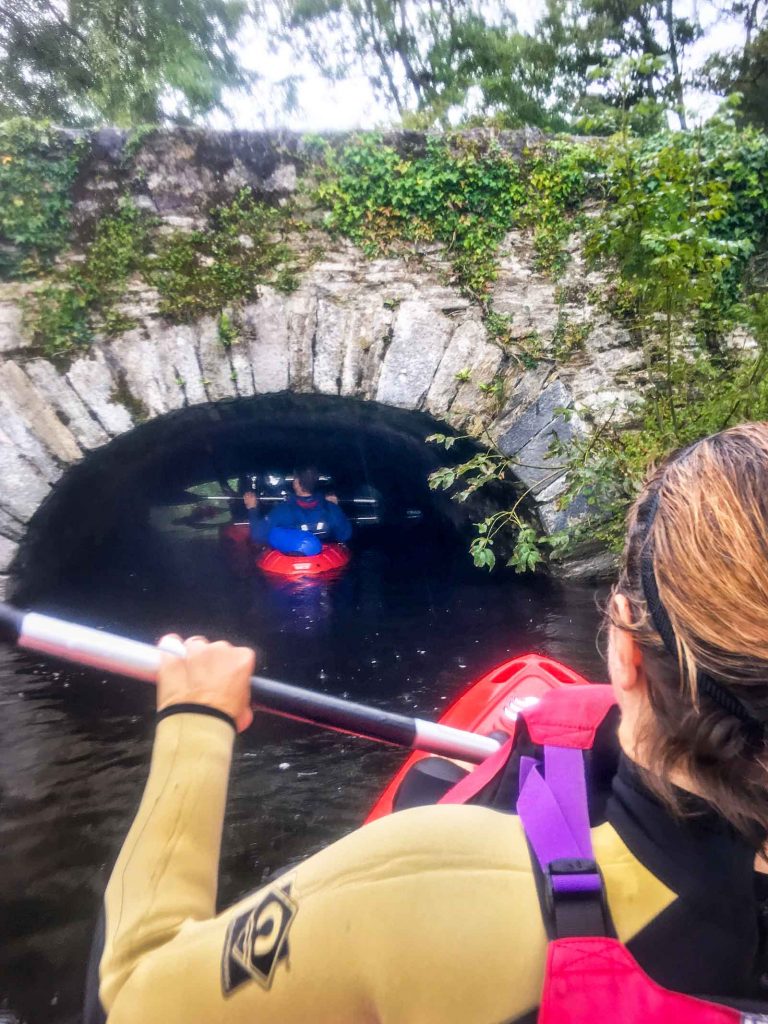 kayaking under the bridge by Ross castle
