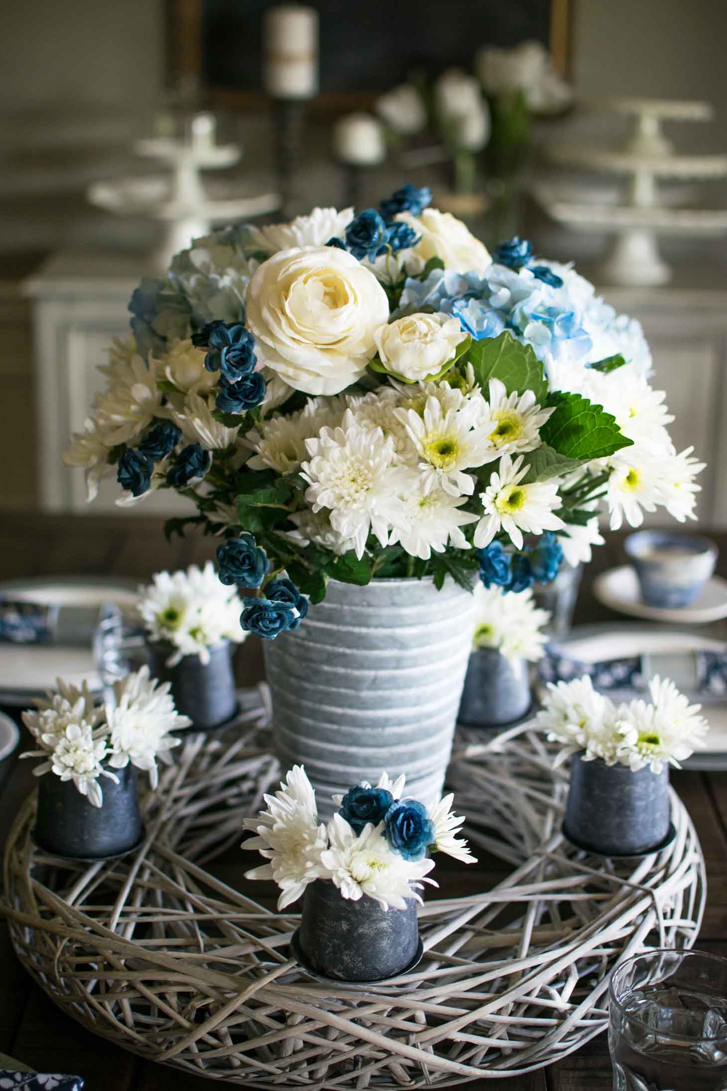Spring floral centerpiece in blue and white 