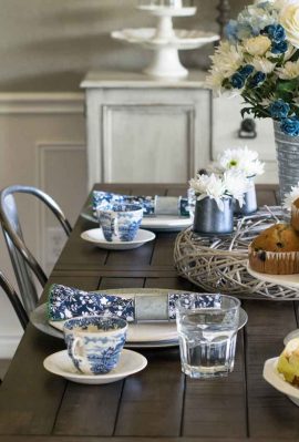 This blue and white china spring tablescape is sure to wow your guests on Easter and beyond. It utilizes antique blue and white antique ironstone as well as modern napkins and a fresh floral centerpiece.