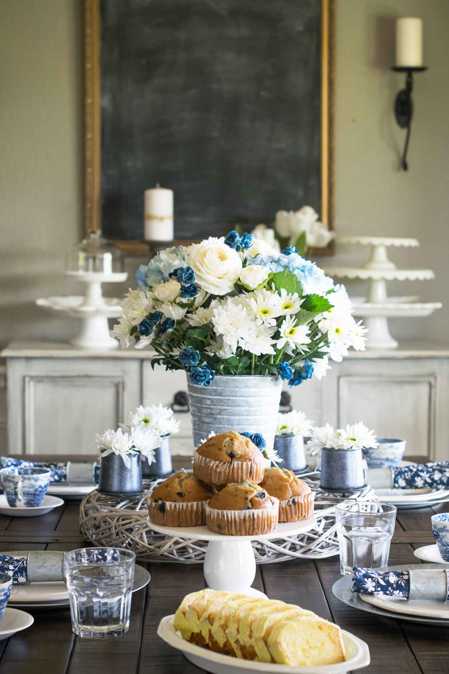 This blue and white china spring tablescape is sure to wow your guests on Easter and beyond. It utilizes antique blue and white antique ironstone as well as modern napkins and a fresh floral centerpiece. via @mrsmajorhoff