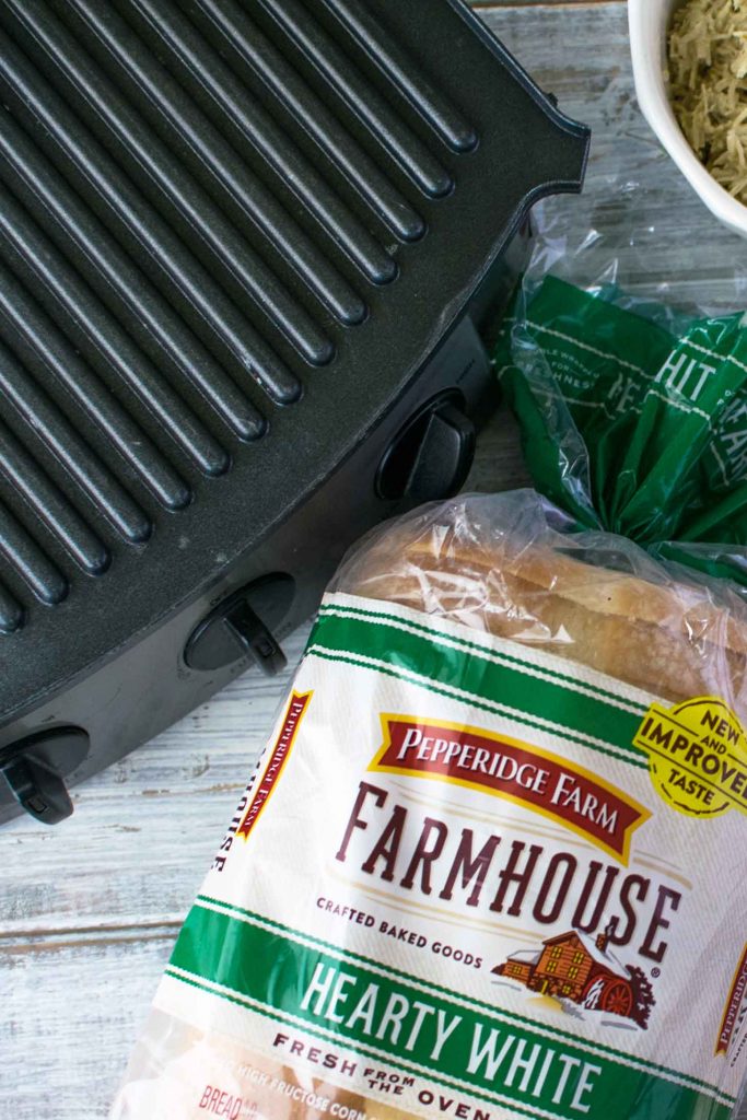 Pepperidge farm farmhouse hearty white bread by a panini press
