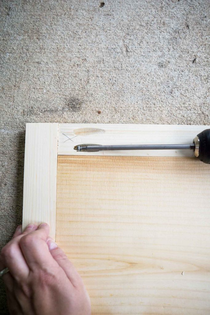 Using a drill to make a DIY frame
