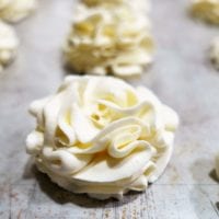 ruffly flowers made from whipped cream stabilized with gelatin and piped with oversized piping tips