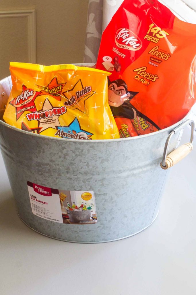 Start with a plain bucket to cover with Vinyl cut from SVG files for a Halloween candy holder