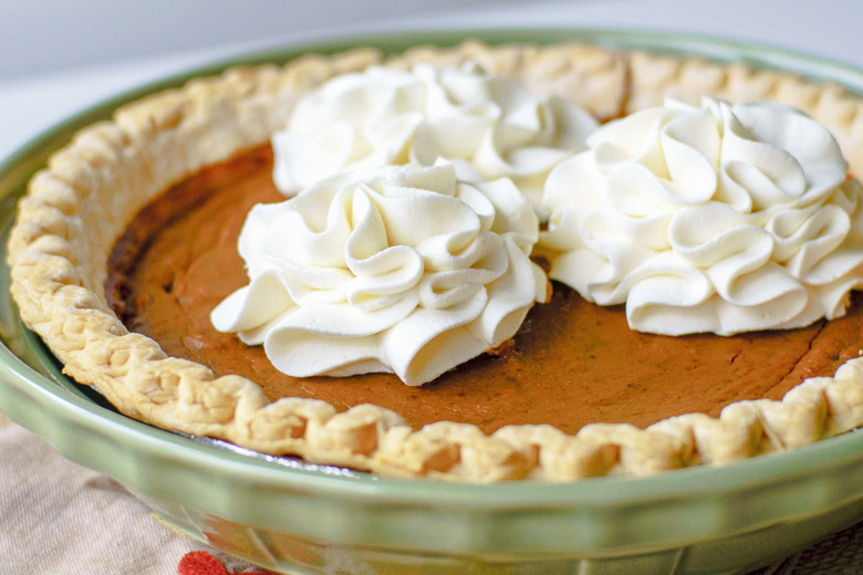 Molasses pumpkin pie is a perfect traditional dessert for your Thanksgiving feast! This old fashioned pumpkin pie recipe with molasses is a hit with guests!