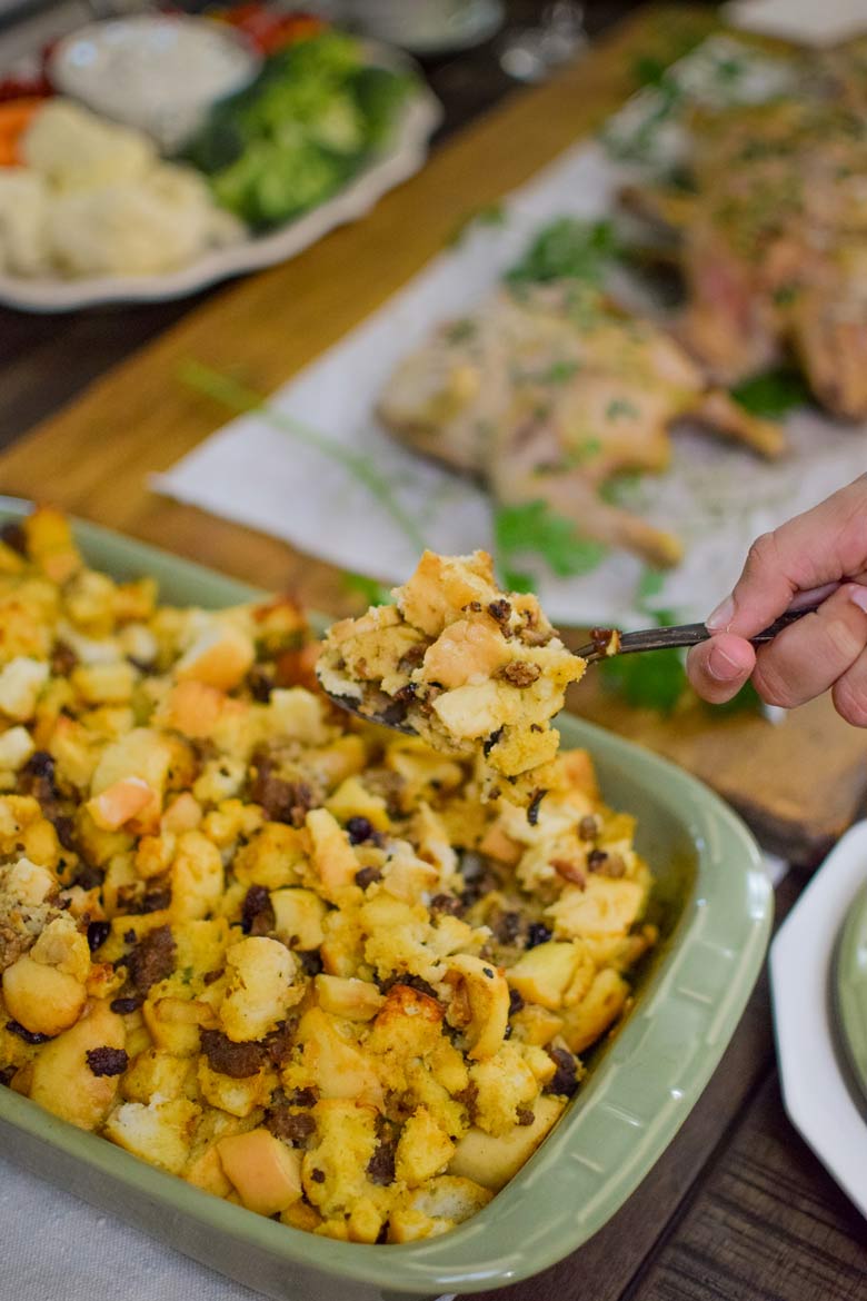 sausage stuffing at Thanksgiving table with cornish game hens