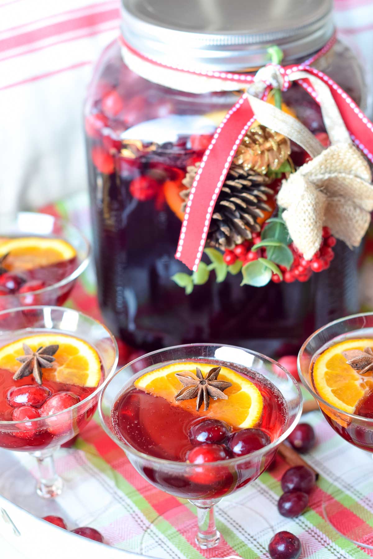cranberry ginger christmas punch can be made with or without alcohol by adding vodka or rum to individual glasses or included straight into the punch bowl