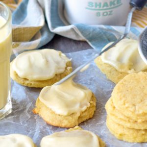 Use an small off set spatula to frost eggnog cookies with eggnog icing