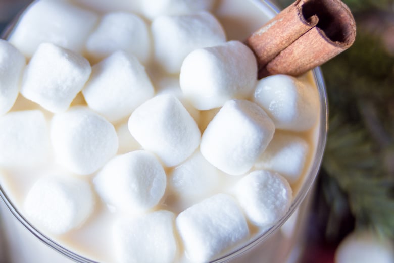 marshmallow and a cinnamon stick for creamy hot cocoa