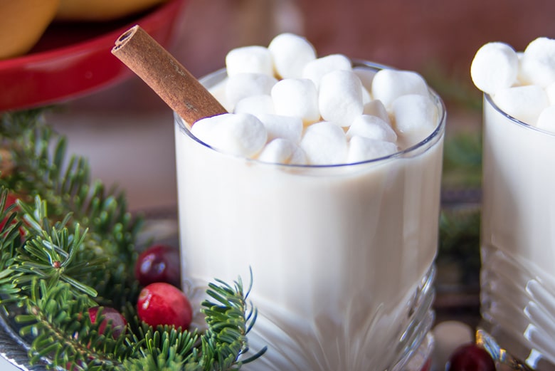 mini marshmallows on a holiday cocktail with marshmallow vodka